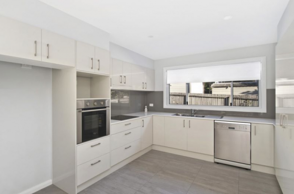 A Kitchen with White Cabinets and Stainless Steel Appliances | Mid-North Coast, NSW | BDM Constructions
