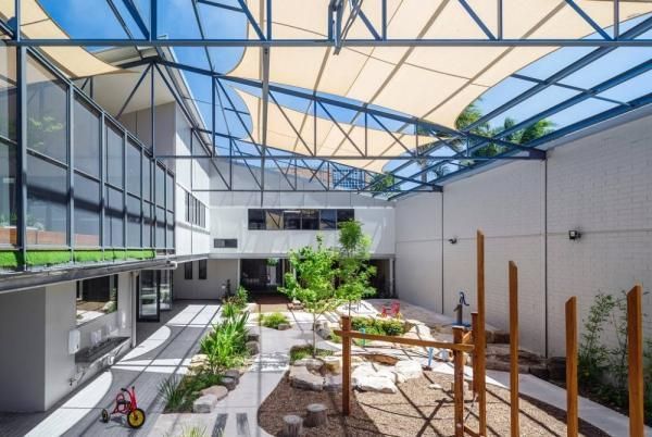 A Large Building with A Playground in The Middle of It | Mid-North Coast, NSW | BDM Constructions