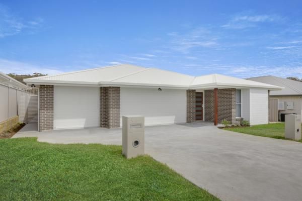 A White House with A Driveway and A Mailbox in Front of It | Mid-North Coast, NSW | BDM Constructions