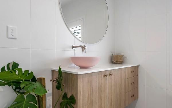 A Bathroom with A Pink Sink and A Mirror | Mid-North Coast, NSW | BDM Constructions