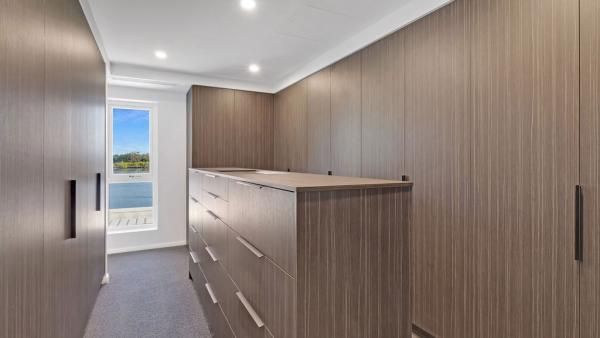 A Walk in Closet with Lots of Drawers and A Window | Mid-North Coast, NSW | BDM Constructions