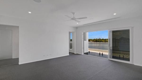 An Empty Room with A Ceiling Fan and A View of A Body of Water | Mid-North Coast, NSW | BDM Constructions