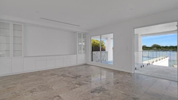 An Empty Living Room with A View of A Body of Water | Mid-North Coast, NSW | BDM Constructions