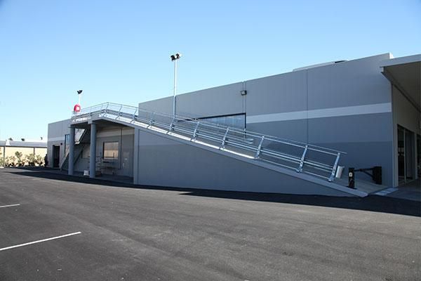 A Large Building with Stairs Leading up To It | Mid-North Coast, NSW | BDM Constructions