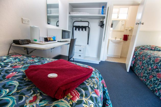 Red Towel In Single Bed- Port Pirie, SA - Travelway Motel