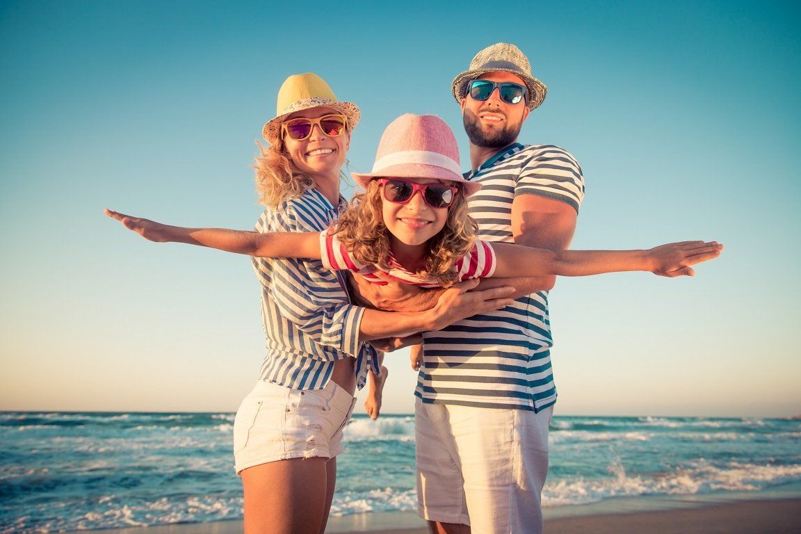 Family on beach — Winter Haven, FL — The Tessier Law Firm Family on beach — Winter Haven, FL — The Tessier Law Firm