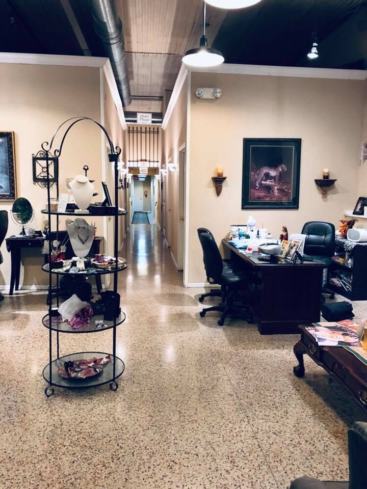A room with a table and chairs in it