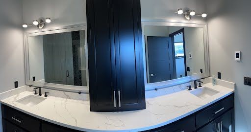 Bathroom with two mirrors by Sun Glass