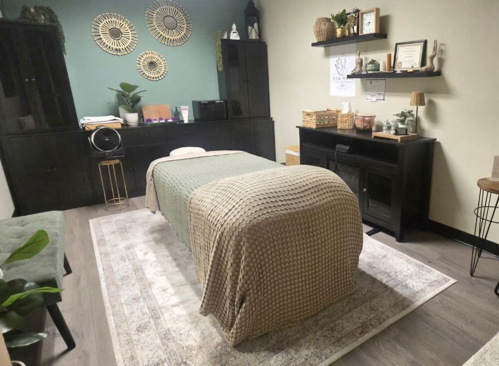 Treatment room at New Move Massage in Pittsfield MA with massage table and calming decor