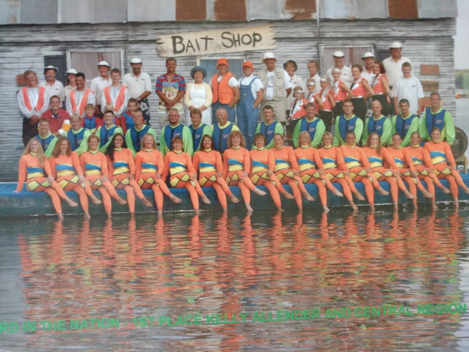 A group of people standing in front of a Bait Shop