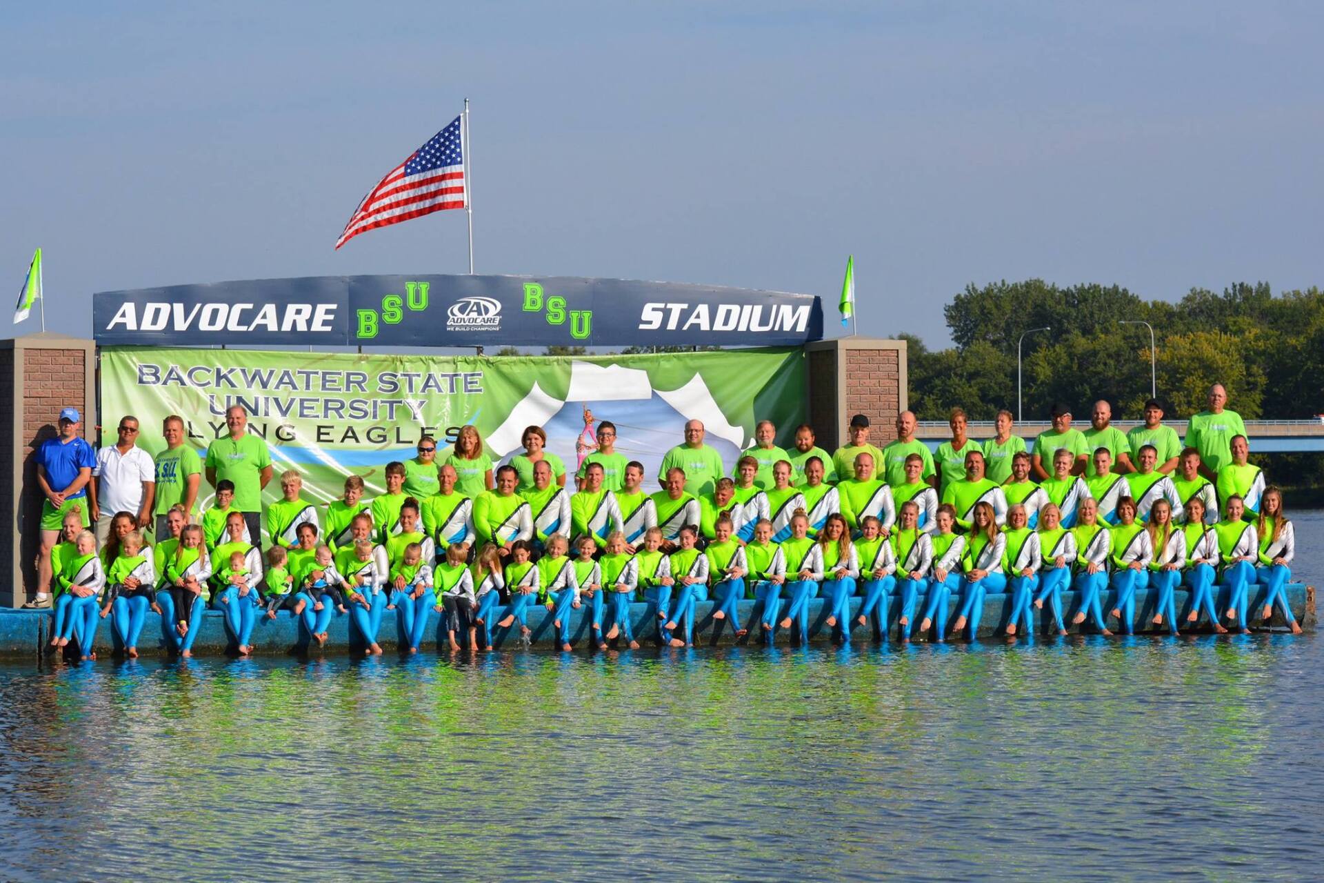 A large group of people are posing for a picture