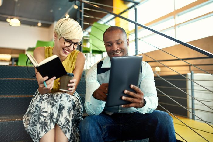Two People Discussing  — Melville, NY — All Access Financial