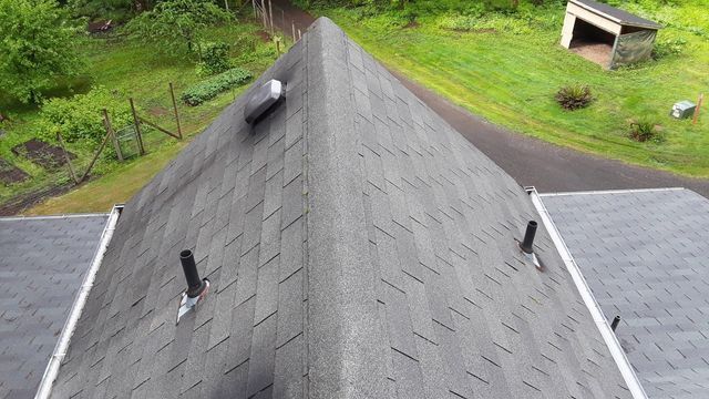 an aerial view of a roof with a triangle shaped roof .