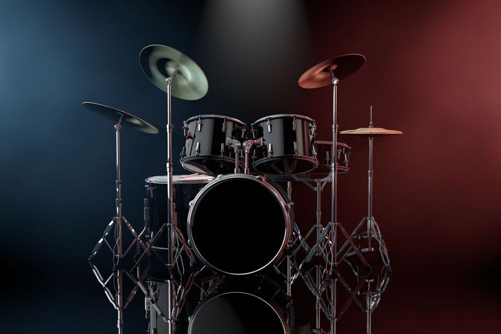 Drum set with black drums, cymbals, and metal stands, set against a red and blue gradient background.