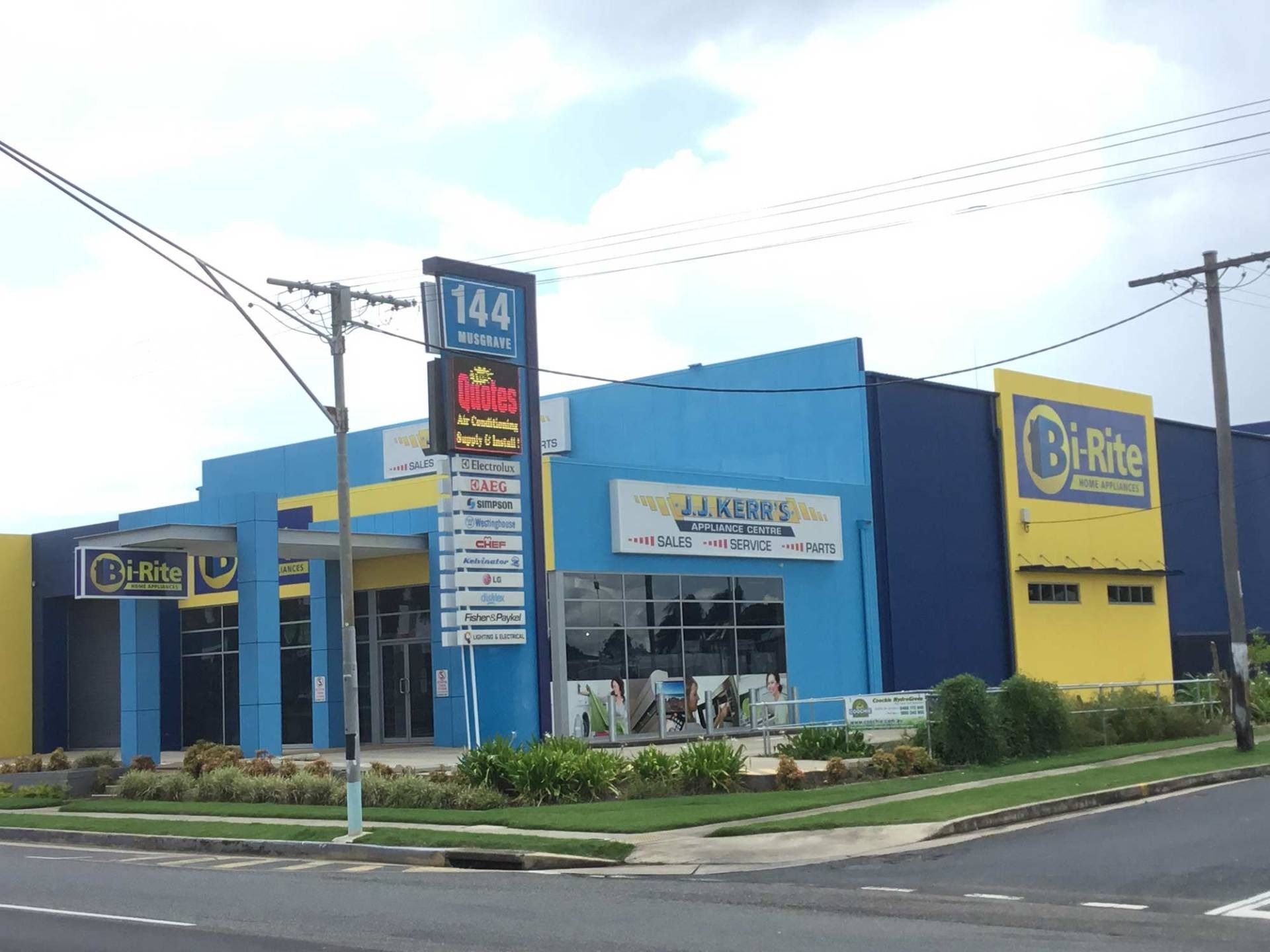 A Kitchen with Stainless steel Appliances and white Cabinets — The Latest Home Appliances in Rockhampton