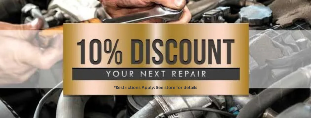 10% discount banner for auto repair, gold and black text over car engine background