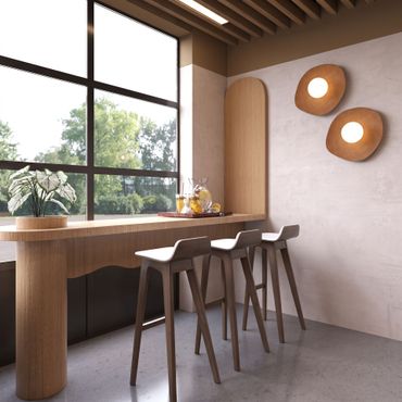 Modern cafe with wooden bar stools, large window, and warm minimalist decor