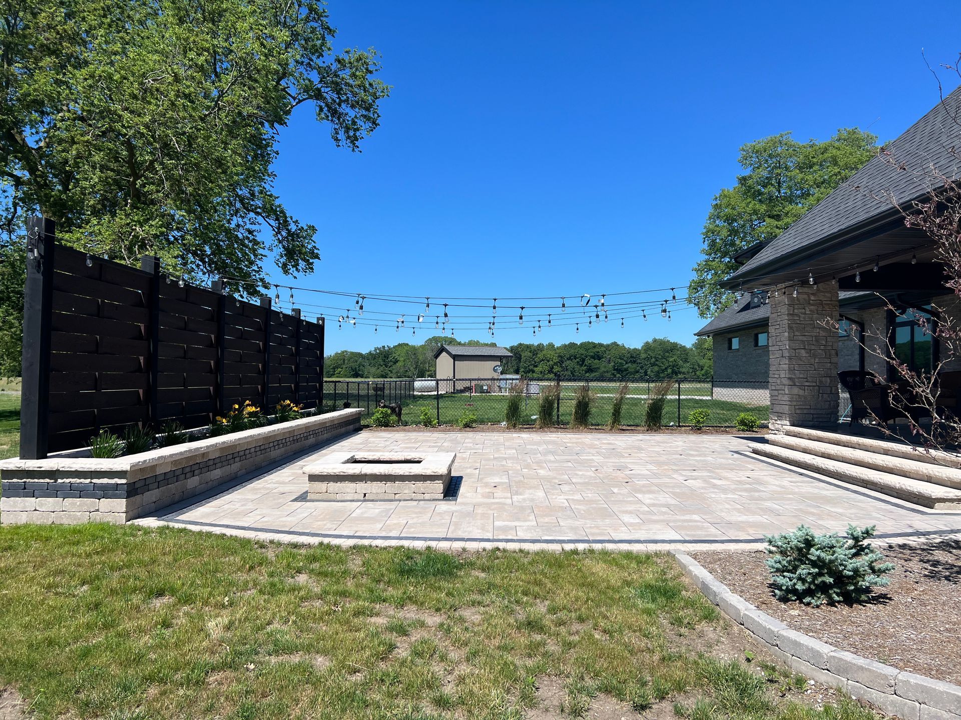 Hardscape installation project by Harkins Unique Landscapes, stonework in central Illinois