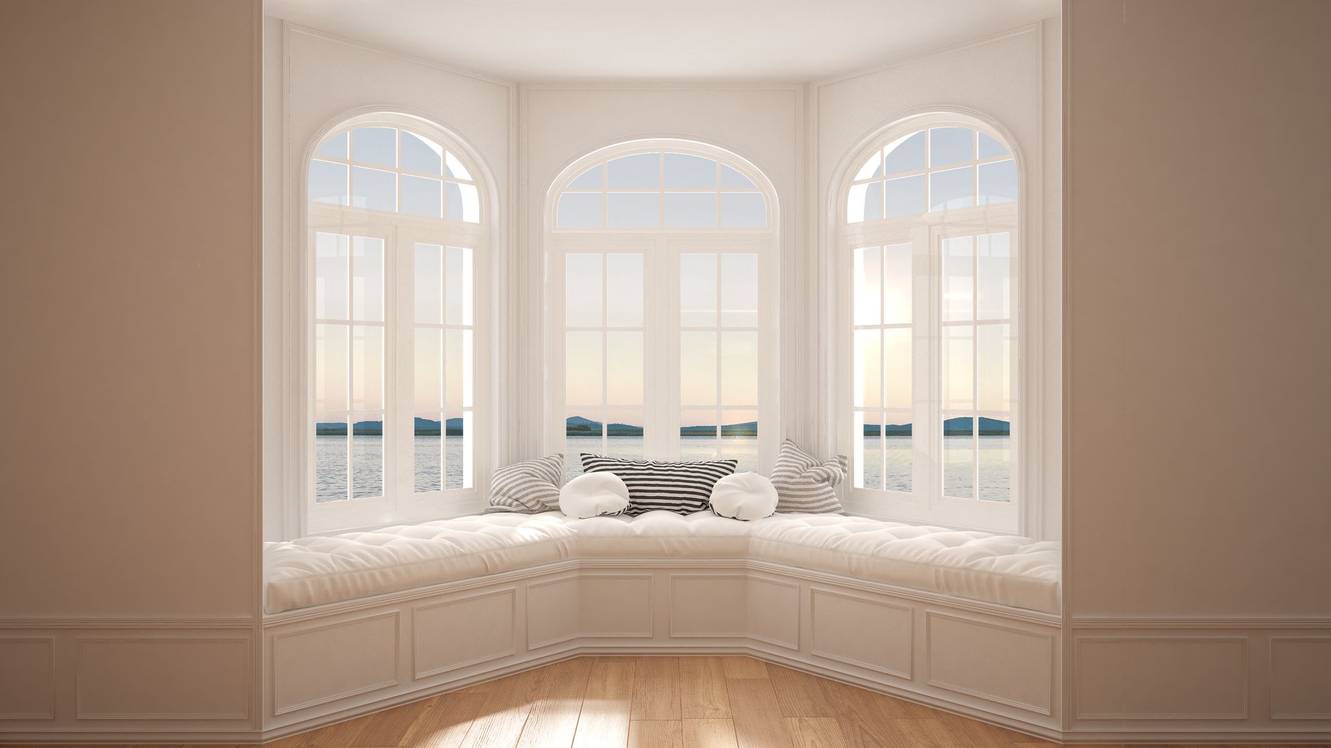 There is a large window seat in the middle of the room.