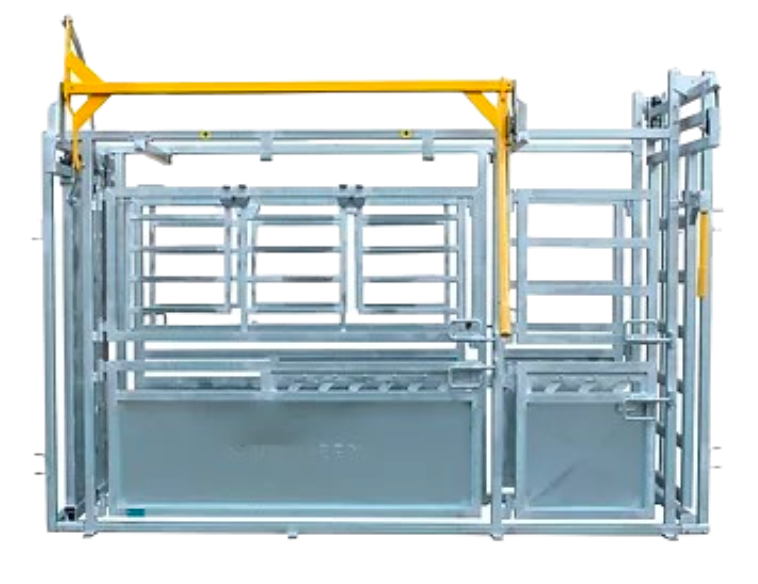 A metal cattle squeeze chute with a yellow overhead lever mechanism against a white background.