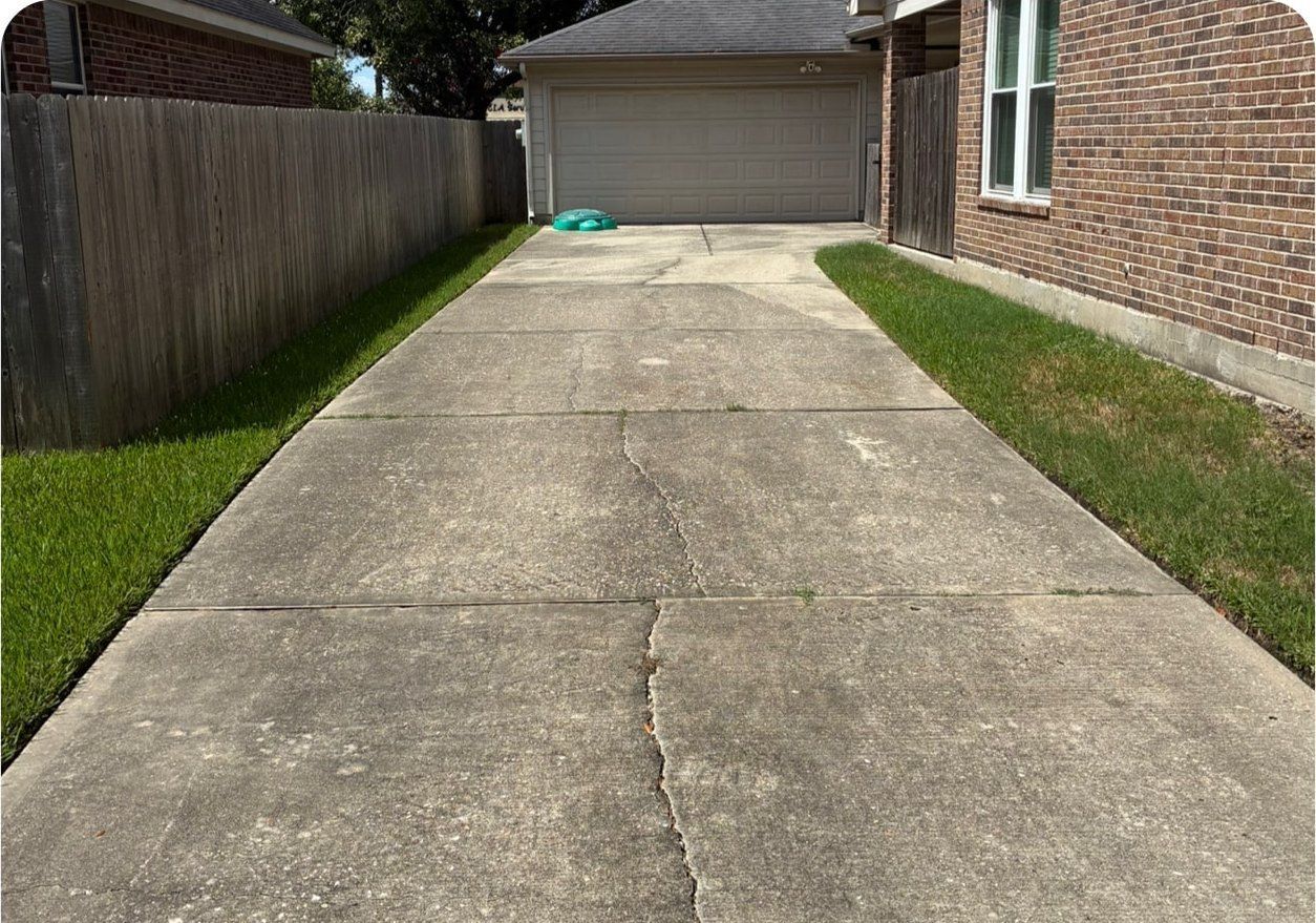 Driveway & Concrete before cleaning by Elite Exterior Cleaning