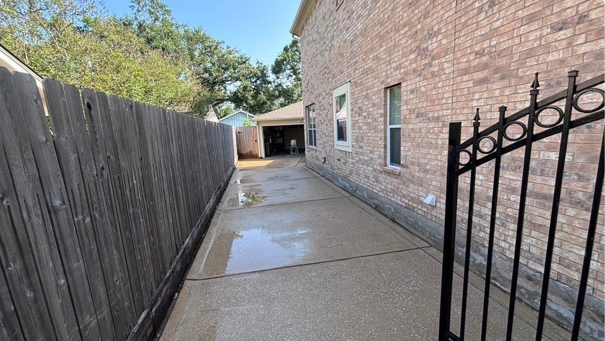 Driveway Cleaning before cleaning by Elite Exterior Cleaning