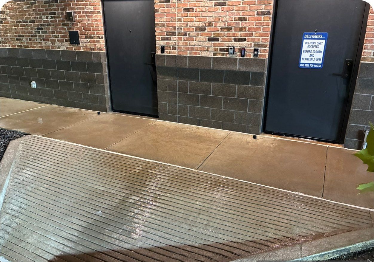 The same surface after commercial pressure washing by Elite Exterior Cleaning