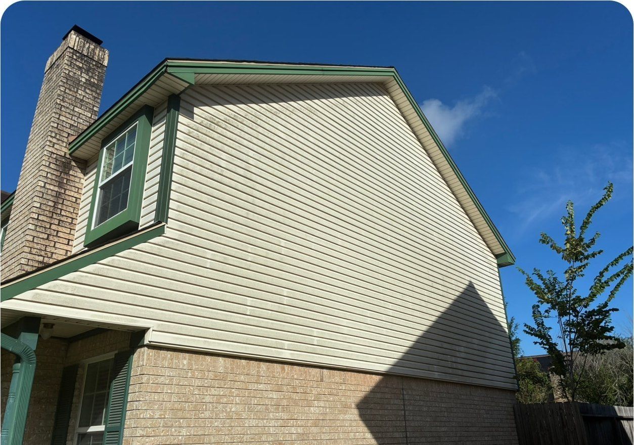 Two-Story House Wash before cleaning by Elite Exterior Cleaning
