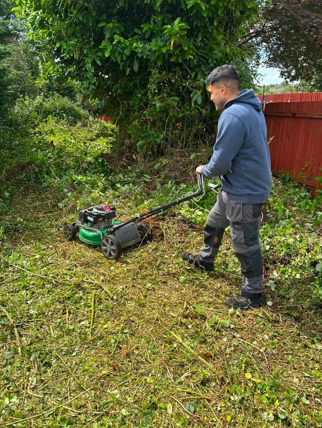 J&Z Property Maintenance mowing a lawn at a Cardiff residential property