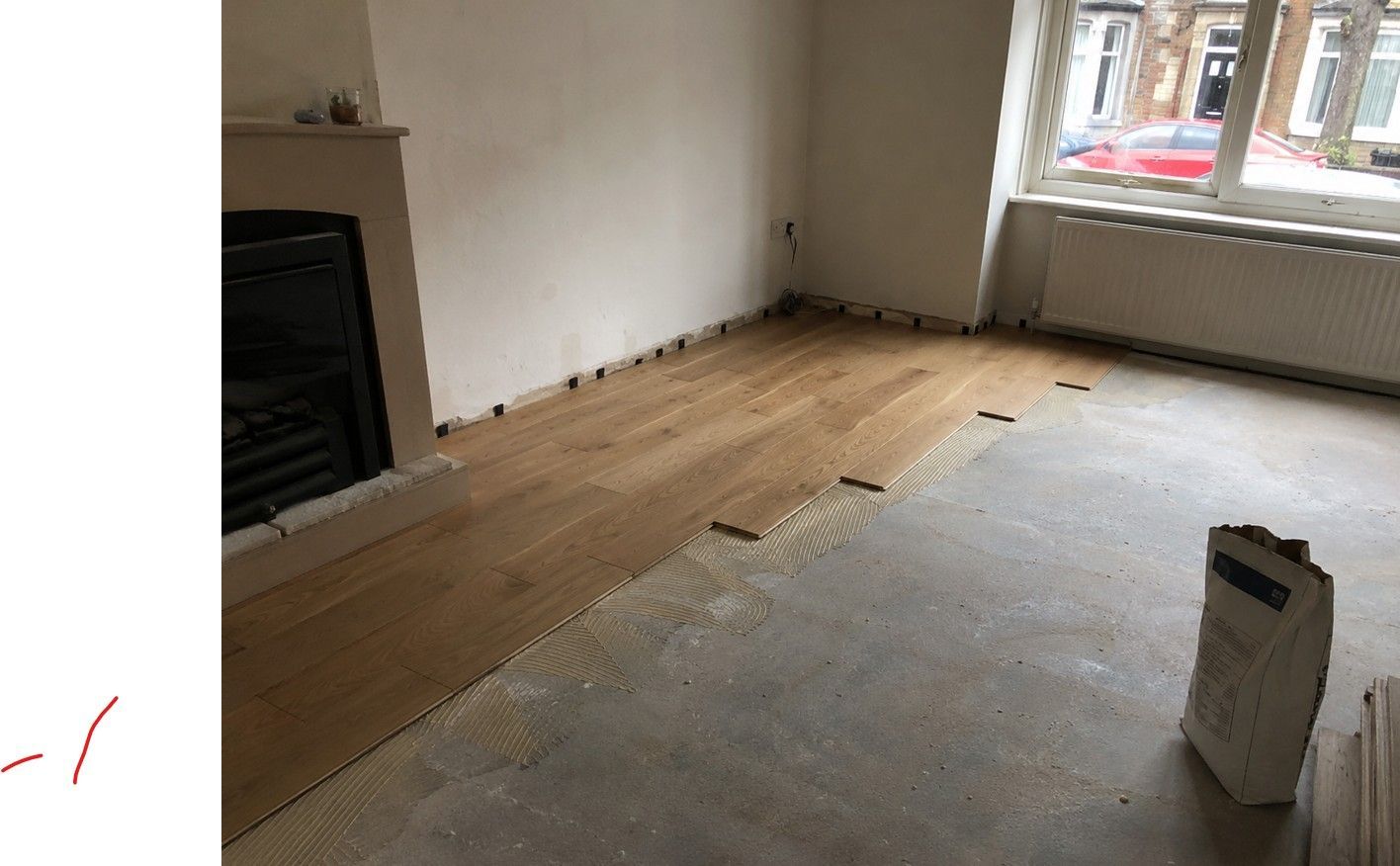 J&Z Property Maintenance fitting new flooring in a Cardiff home