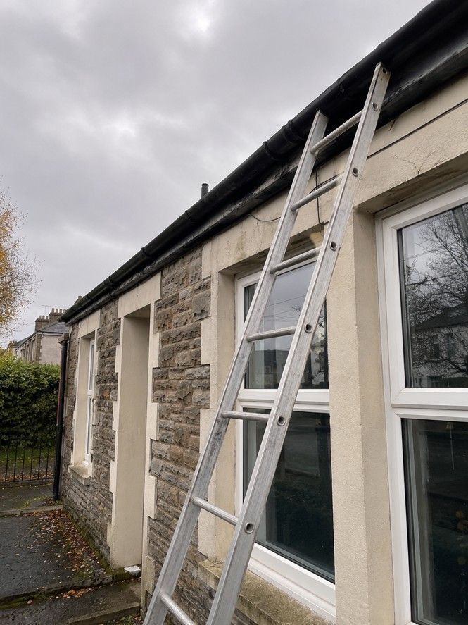J&Z Property Maintenance carrying out seasonal gutter maintenance at a Cardiff property