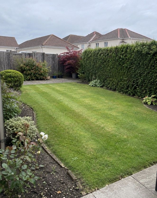 J&Z Property Maintenance gardeners maintaining a garden in Barry Vale of Glamorgan