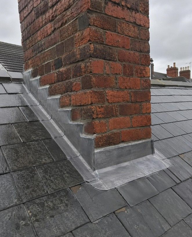 J&Z Property Maintenance fitting lead flashing around a chimney in Barry
