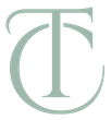 The letter t is in a circle on a white background.