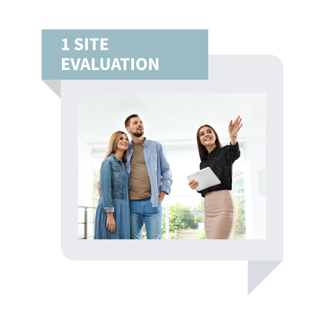 Three people standing indoors beside a “Site Evaluation” banner, one holding a clipboard and pointing upward.
