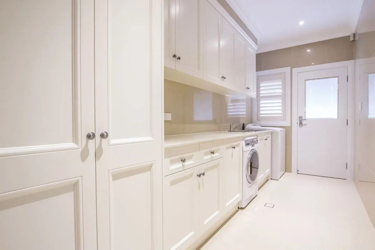 Sleek and Modern White Laundry Room Design | North Richmond, NSW | Pace Kitchens