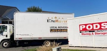 box truck parked behind a container