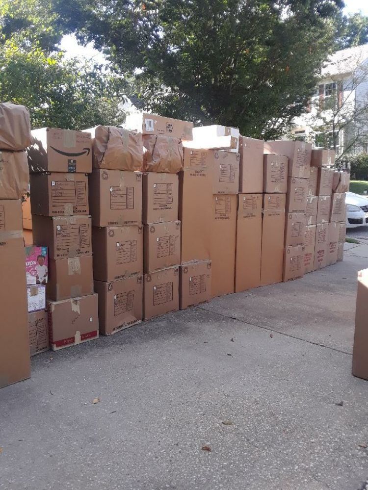 packed moving boxes are on the floor