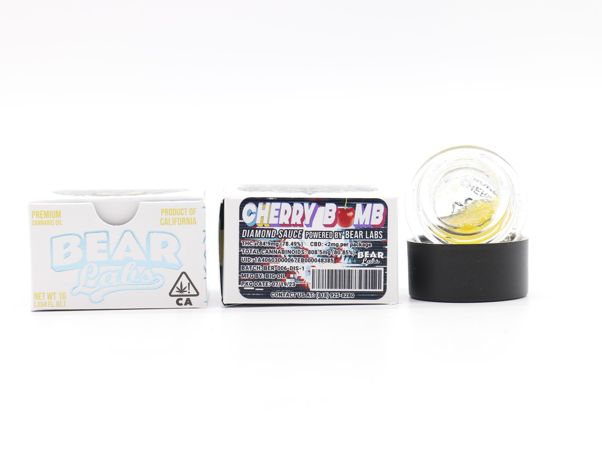 A box of bear labs next to a jar of Cherry Bomb