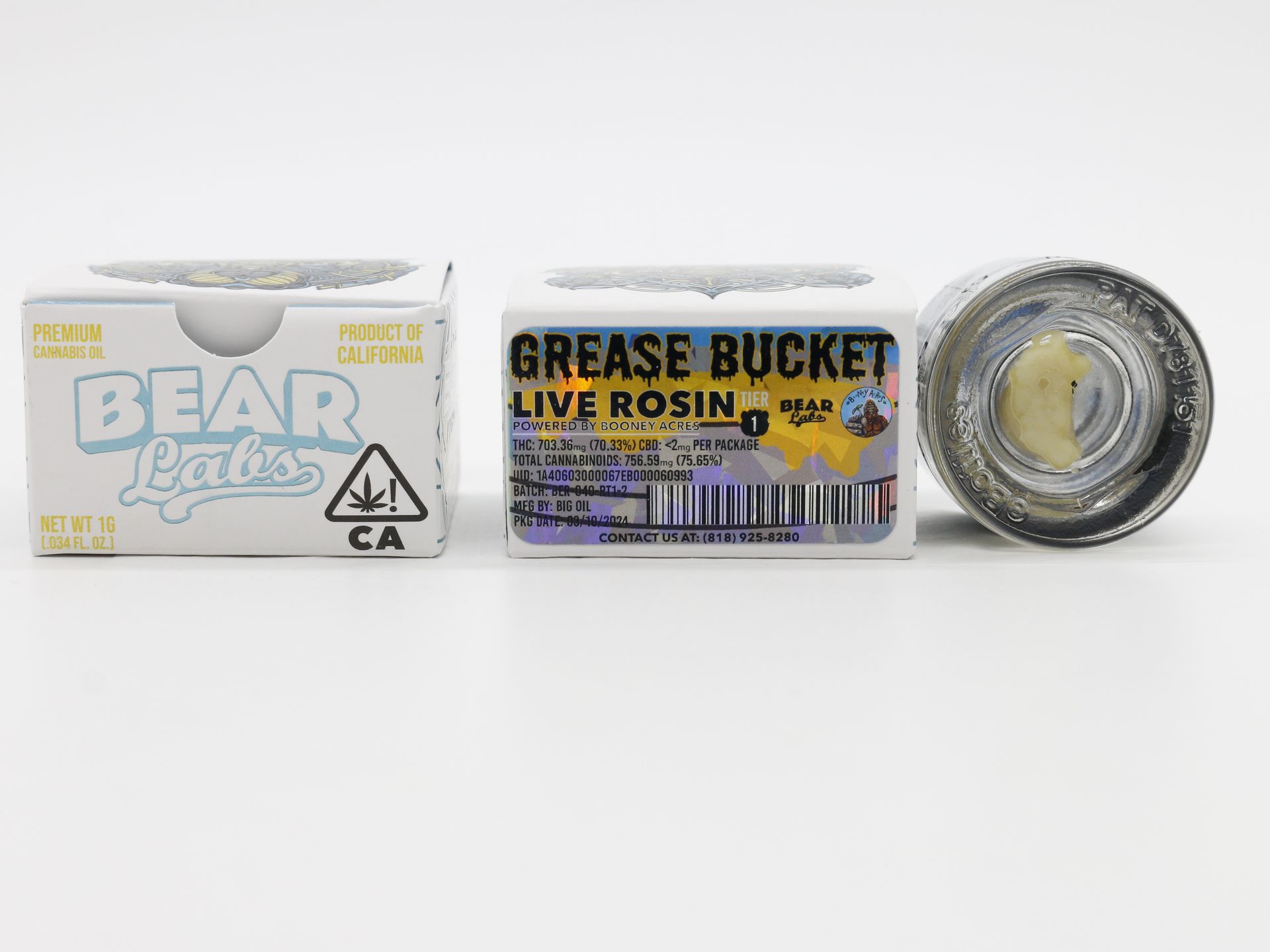 A box of bear labs next to a jar of Grease Bucket