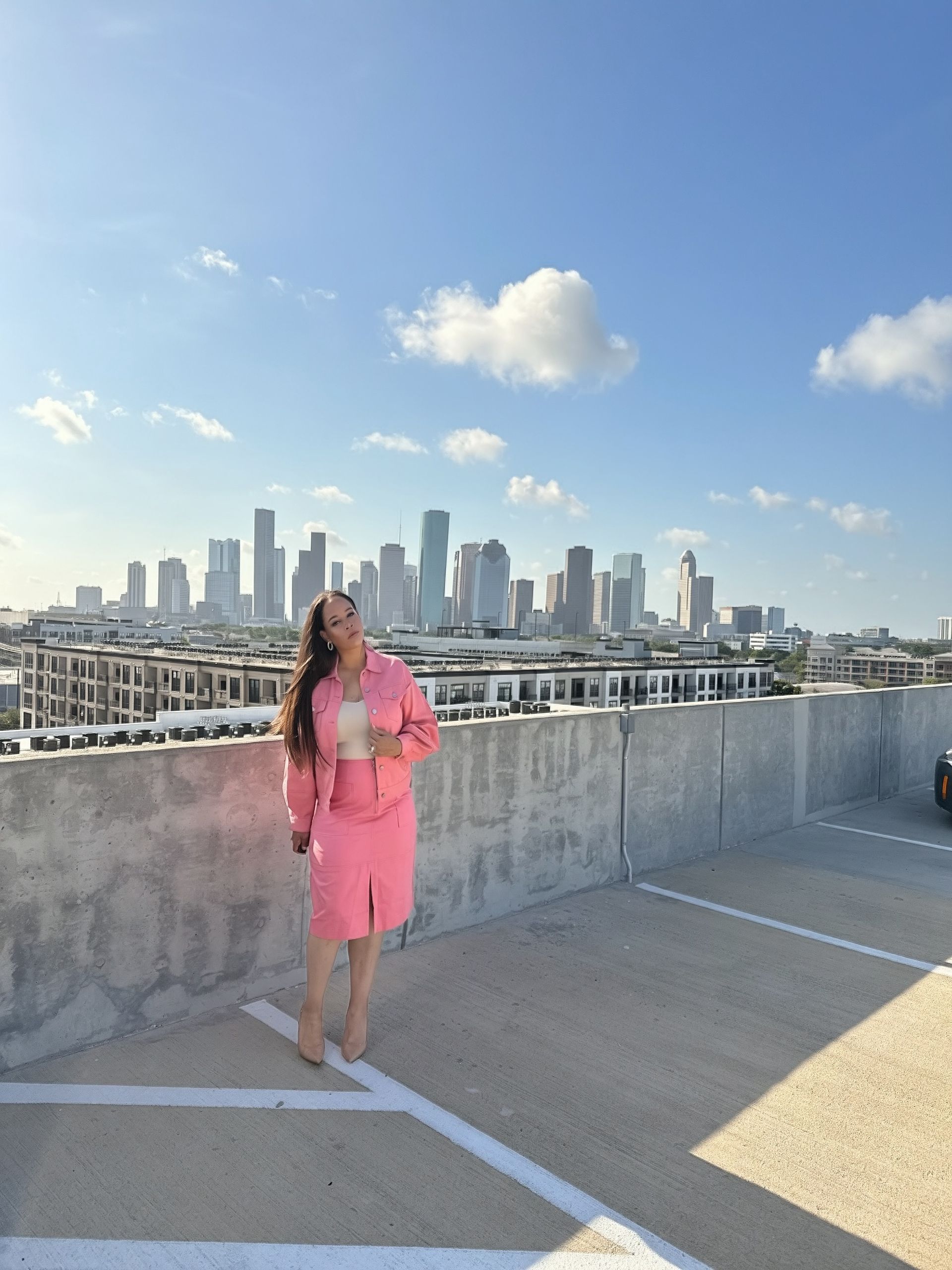 Salmon Pink coordinated outfit — alternate pose against the Houston skyline