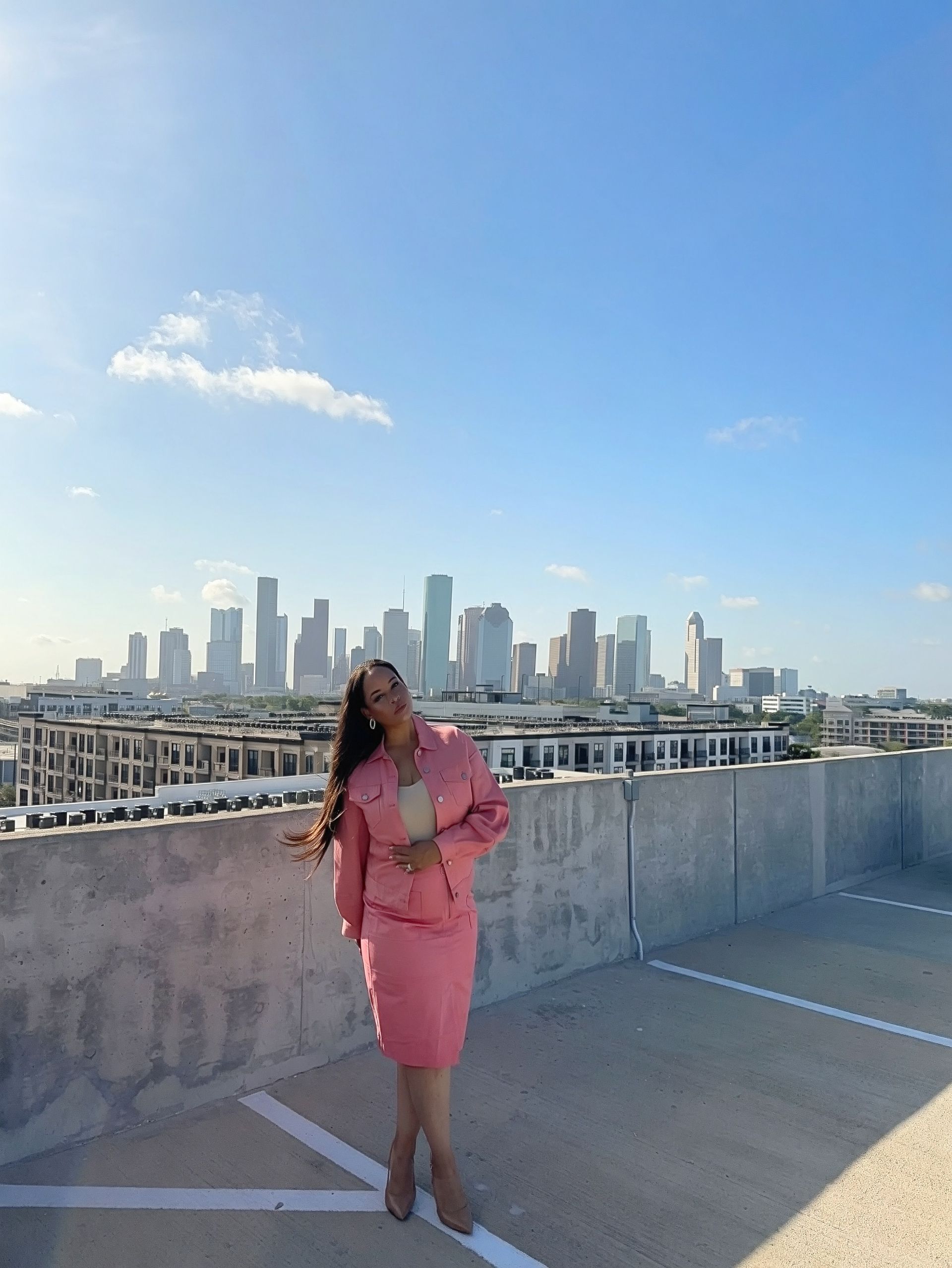 Salmon Pink coordinated outfit — alternate pose against the Houston skyline