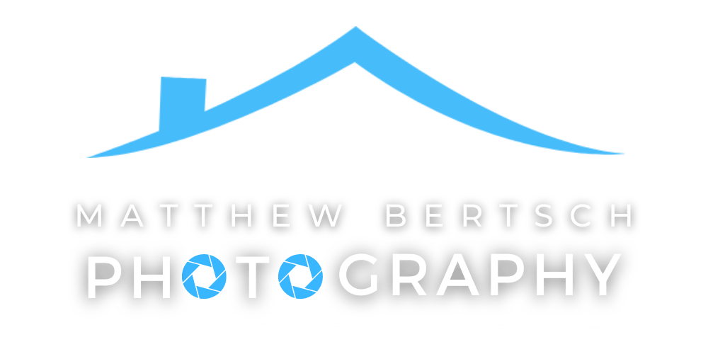 The logo for matthew bertsch photography is a blue house with a roof.