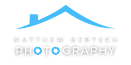 The logo for matthew bertsch photography is a blue house with a roof.