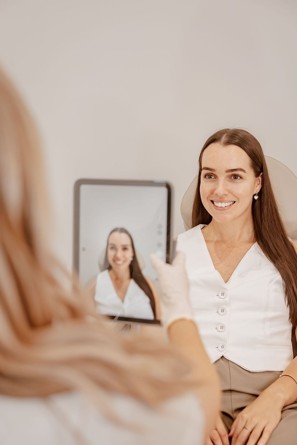 A Woman is Giving a Woman a Scan to Map the Face — Gorjess Aesthetics in Corrimal, NSW