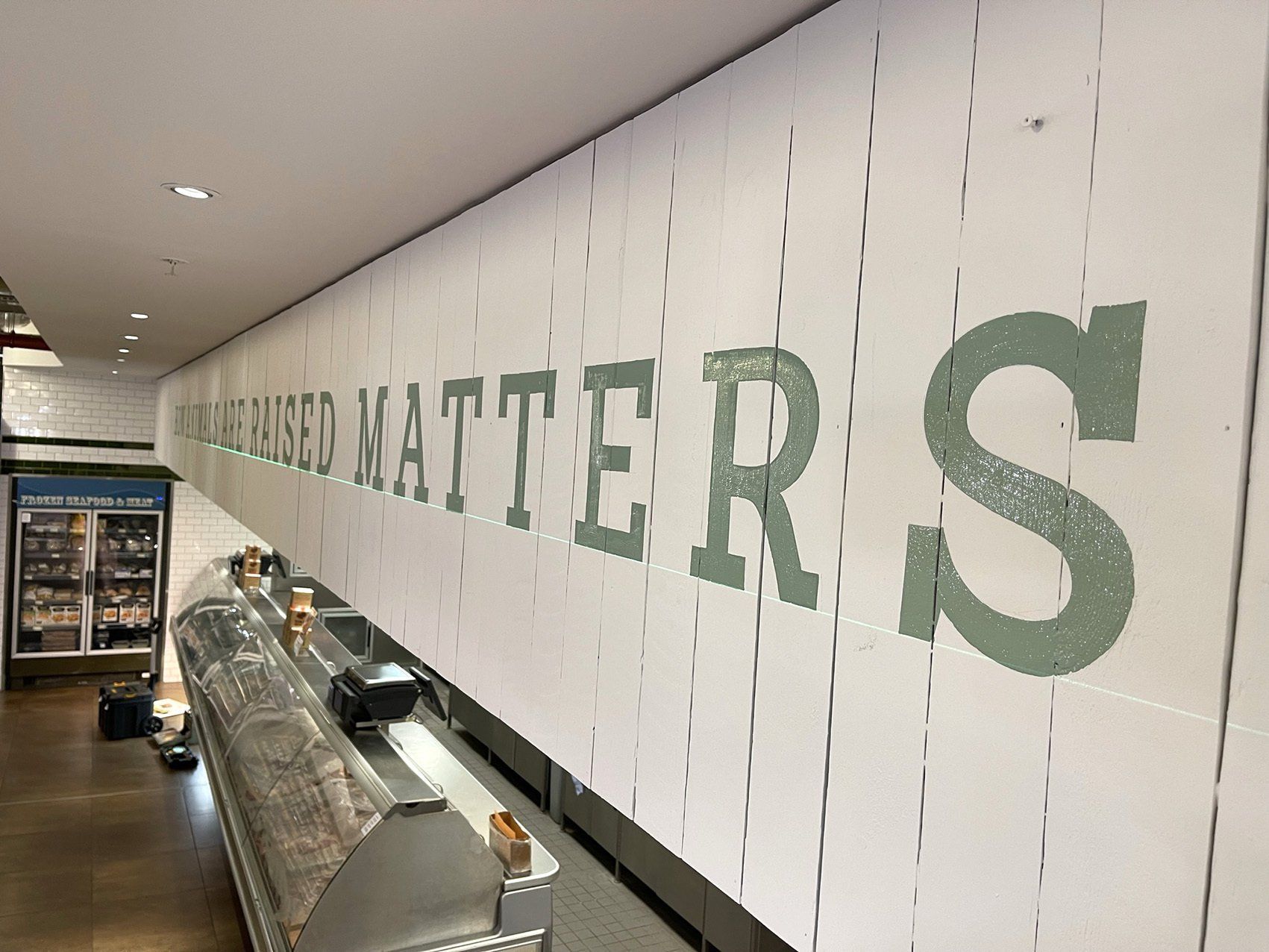 The Sign Painter Whole Foods wall signwriting