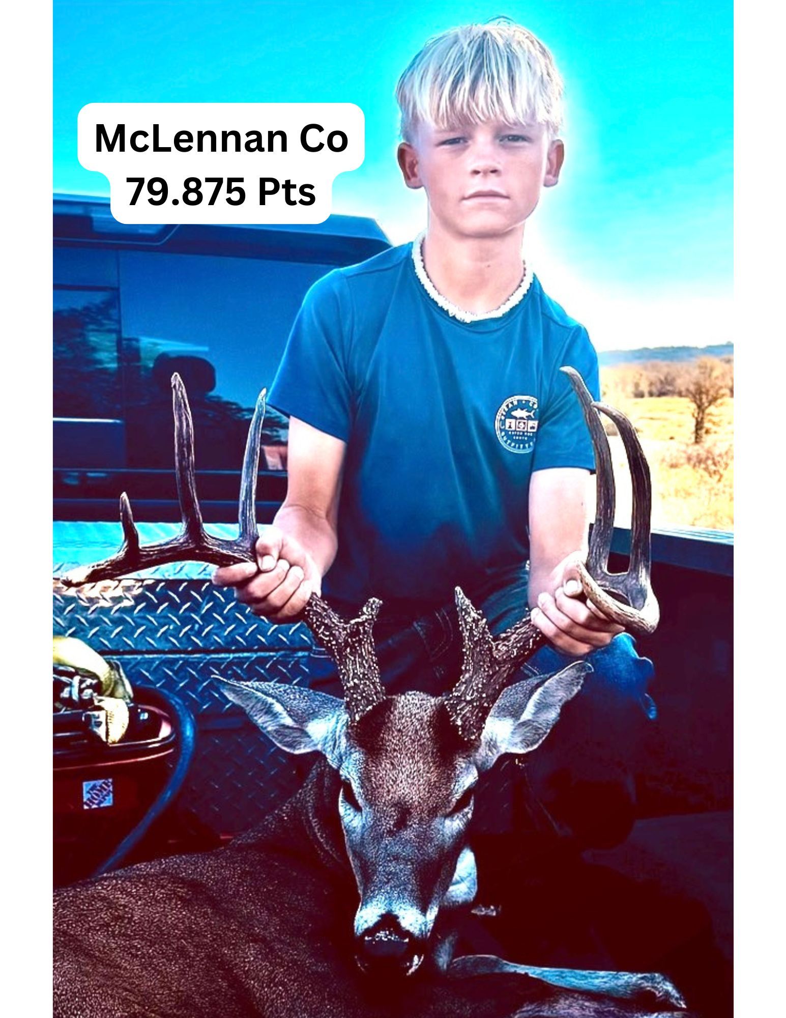 Boy holding a deer with antlers, McLennan Co, 79.875 Pts.
