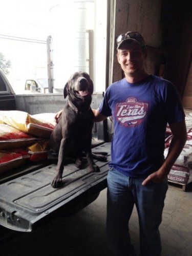Man with Dog — Clifton, TX — Clifton Feed and Service