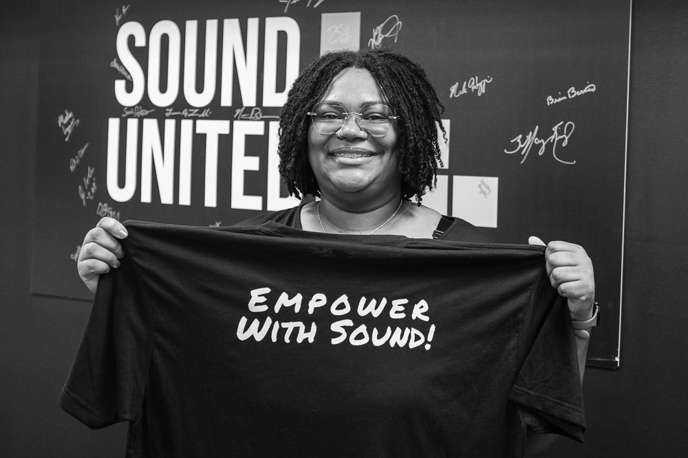Guest with gifted t-shirt