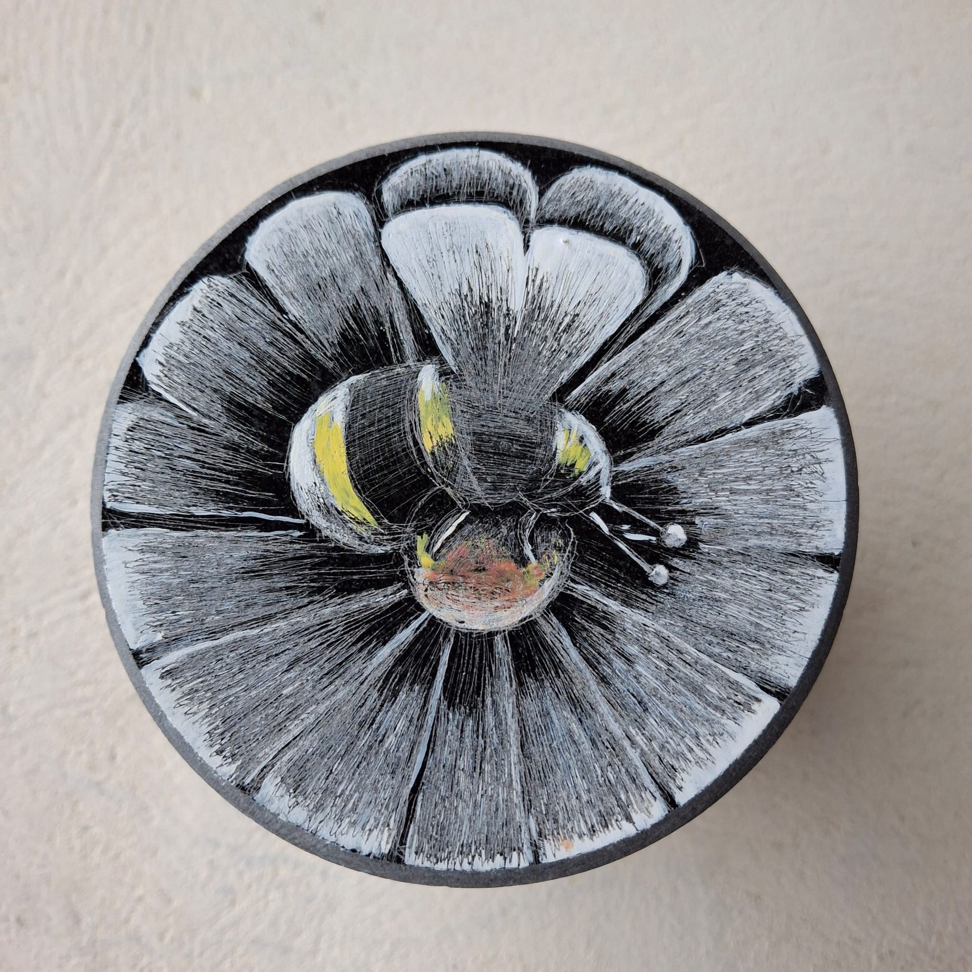 Mr Big Bee on a flower doorstop or paperweight
